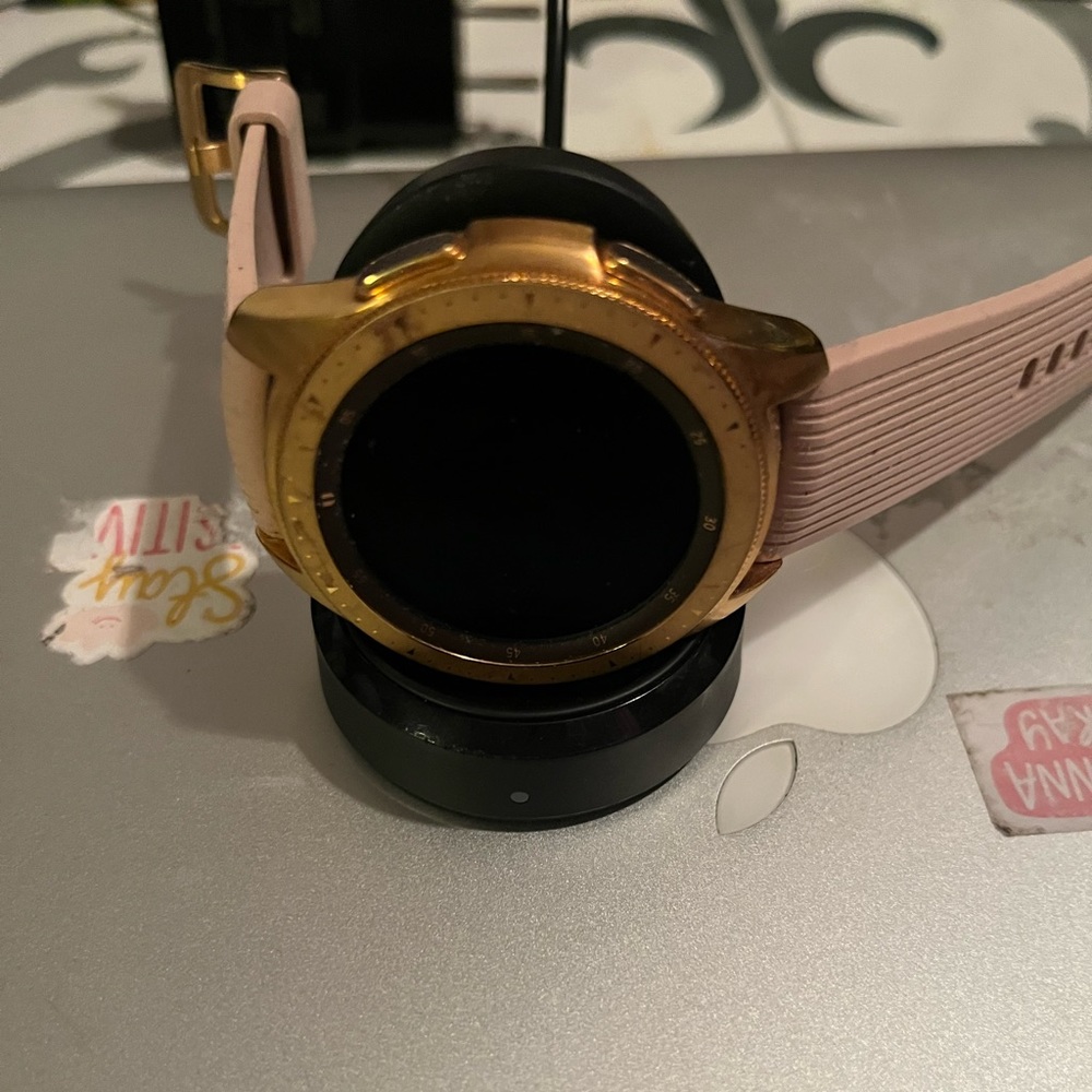 Samsung smartwatch, slightly used, with charger.